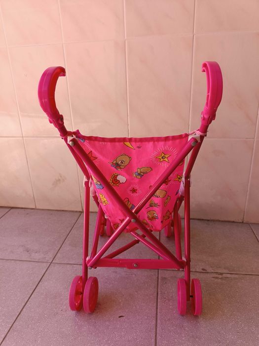Carrinho bébé rosa para brincar, dobrável