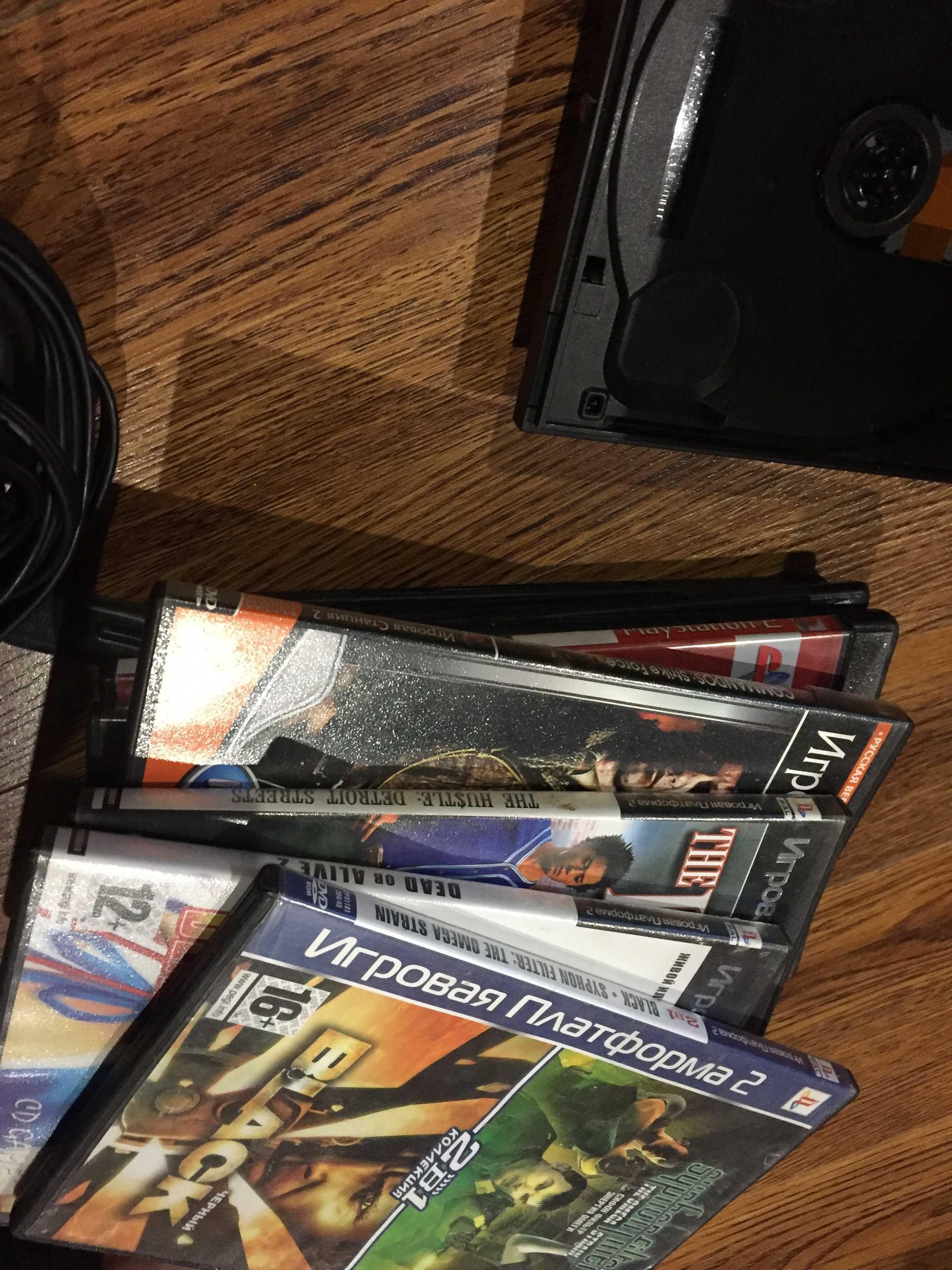 Sony PlayStation 2    Два Джойстика куча игр