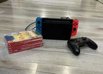 Nintendo Switch + gry + pad