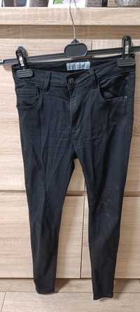 Czarne jeansy 34
