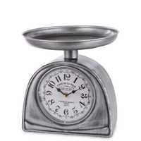 Zegar kominkowy stojący metalowy srebrny 27 cm z podstawką na kwiatka
