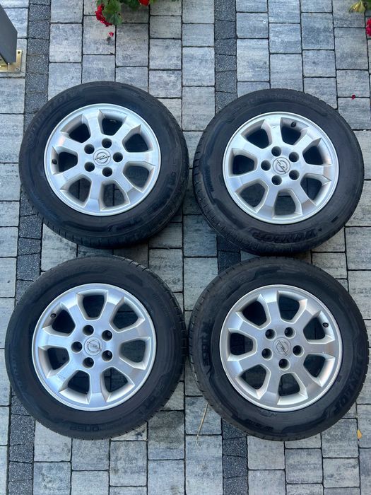 Felgi aluminiowe 15" z oponami letnimi Opel