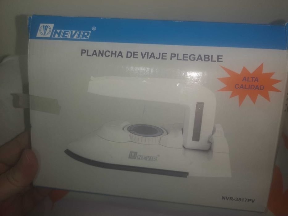 Ferro de viagem novo