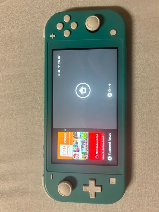 Nintendo Switch Lite + Zelda BotW + Etui