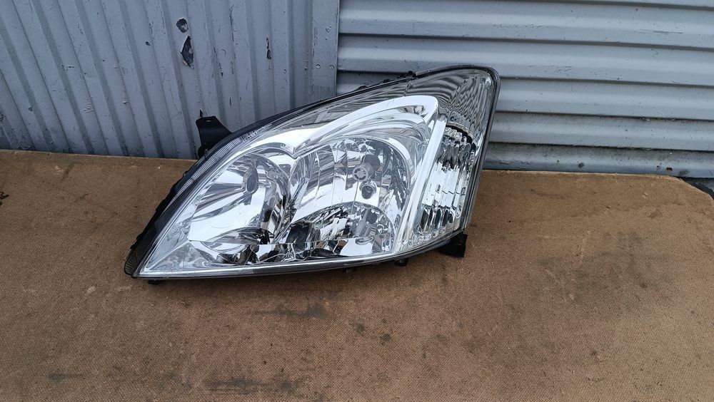 Vendo farol esquerdo de Toyota Corolla E12 ano 2001/09