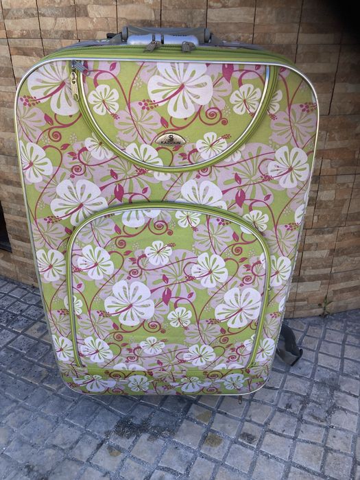 Mala de viagem de porão em bom estado