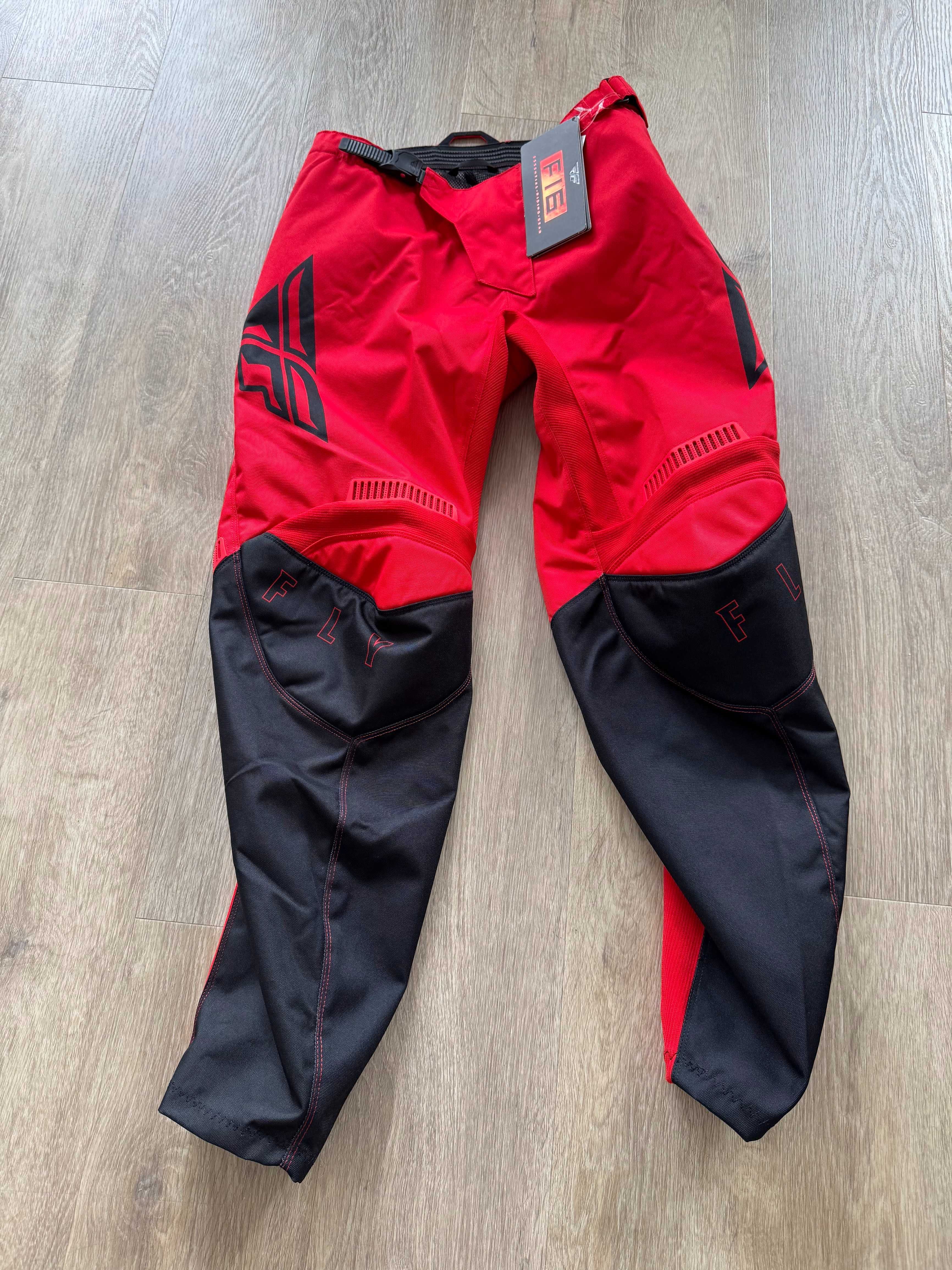 Spodnie off-road FLY Racing F16 rozmiar 32. Czerwono-czarne.