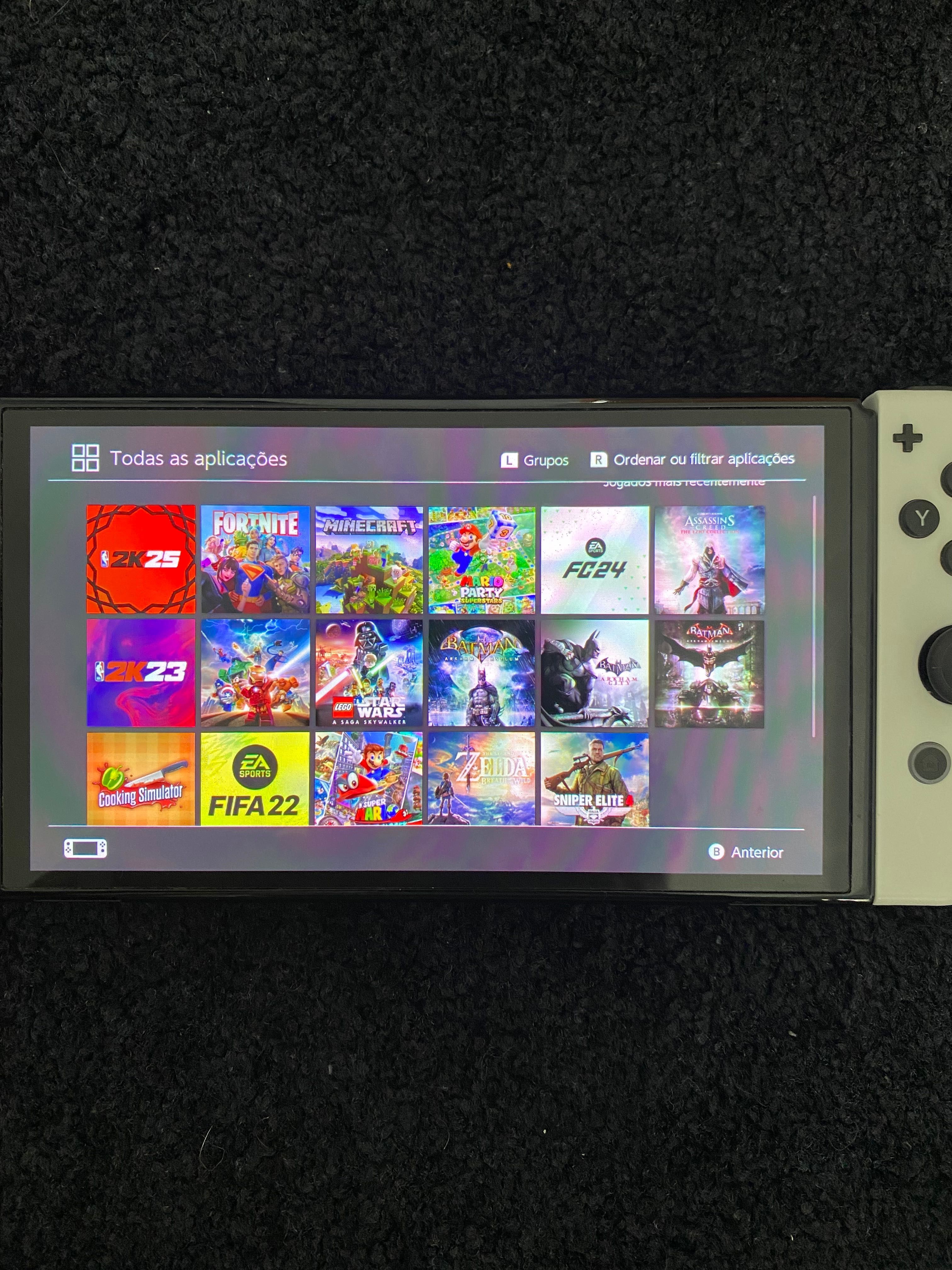 Nintendo switch oled+11 jogos físicos+ 2 joycon extra+cartão128gb+5dig
