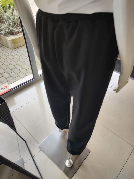 Masełkowe spodnie dresowe z ociepleniem - czarny One size