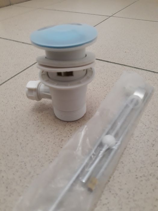 Korek do umywalki z przelewem