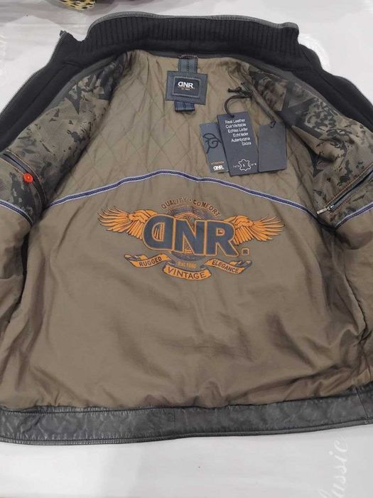 Продаю шкіряну куртку коричневого кольору