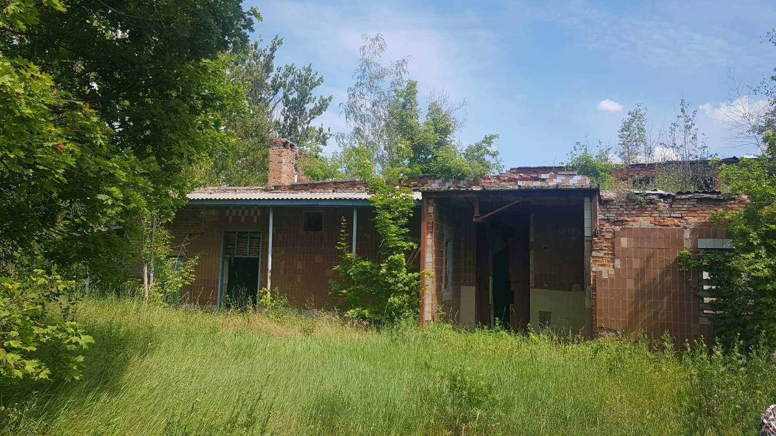 Валки.  0.8 ГА с ветхими зданиями под производство.Экс мясокомбинат.AN