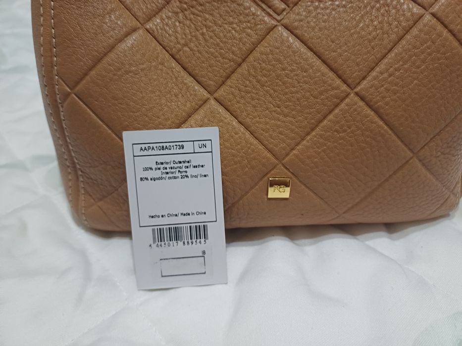 Mala, carteira nova Purificación García