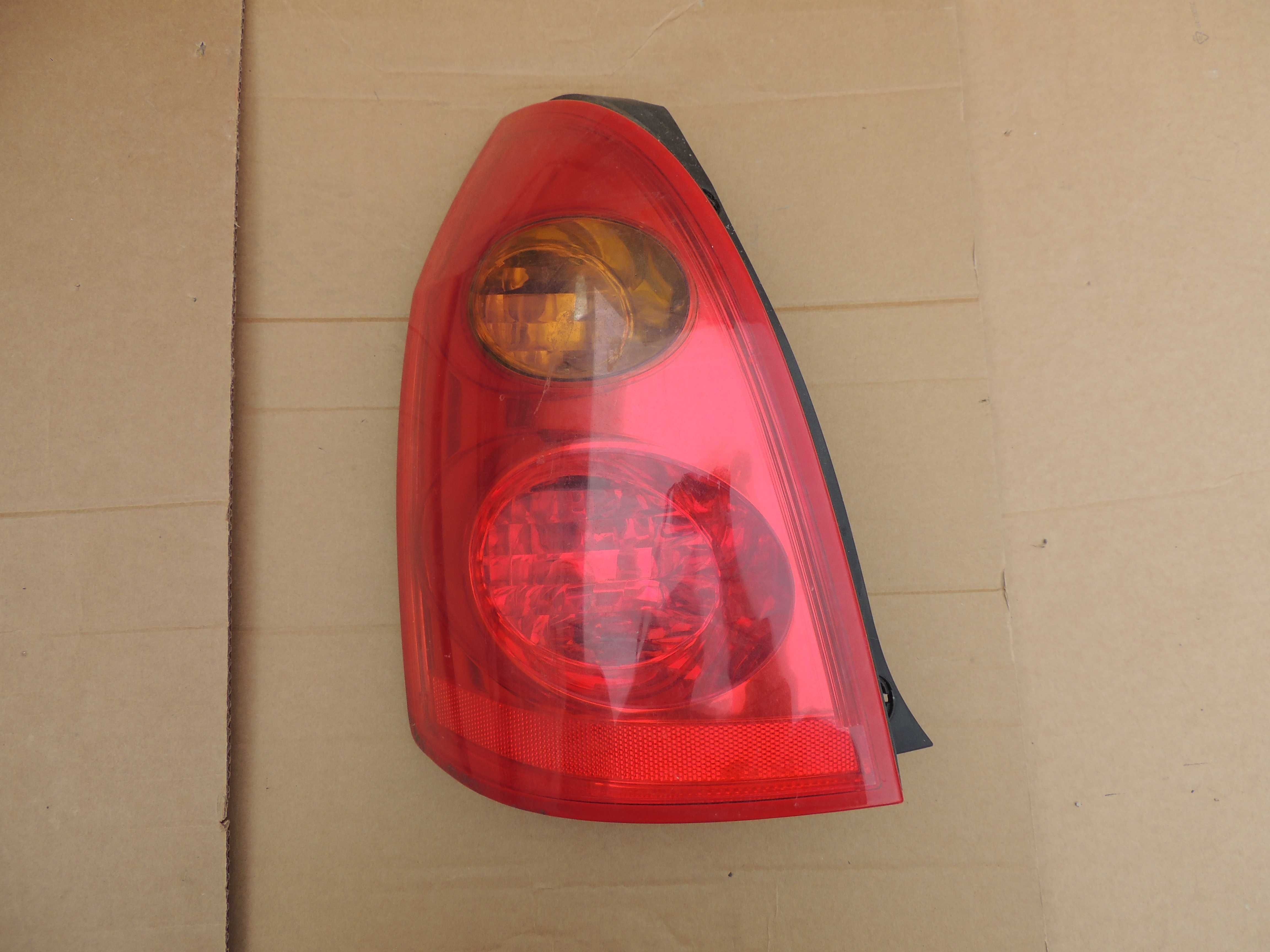 Lampa tył tylna lewa europejska Nissan Primera P12 kombi 02,03,04-07