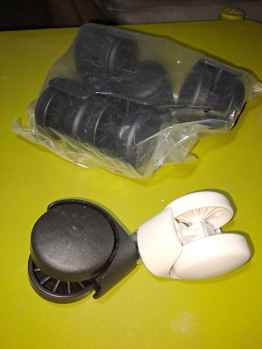 Роліки, колеса для офісних стільців нові білі чорні.