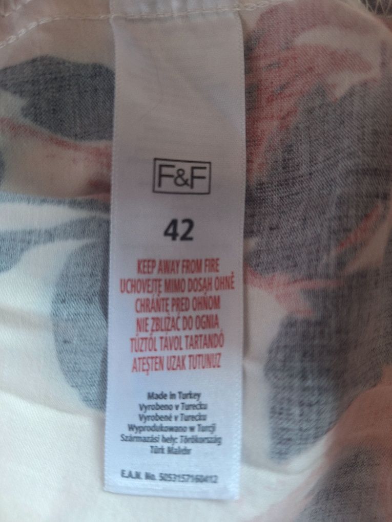 Lekka sukienka w kwiaty przed kolano roz. 42
