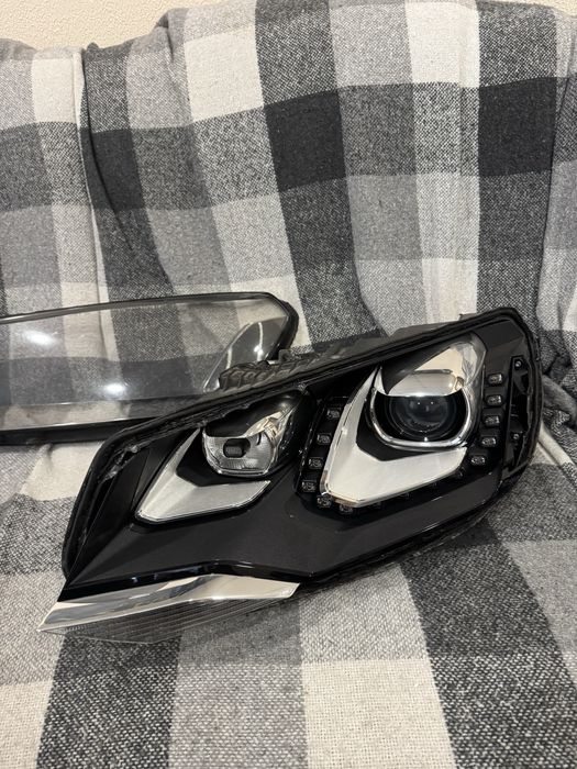 Фара ліва Touareg NF Європа, скло фари, маска фари