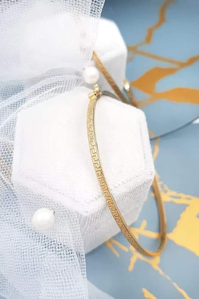 Bransoletka złota diamentowana. Bangle. Wzór grecki