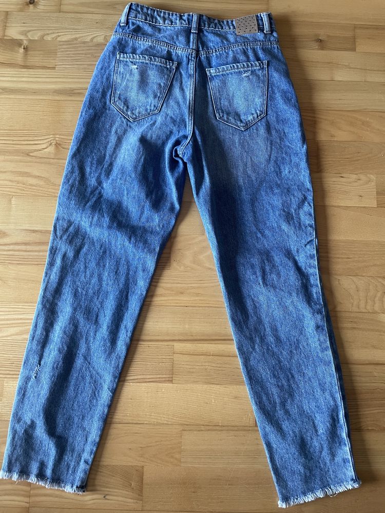 Spodnie jeansy Mohito 32