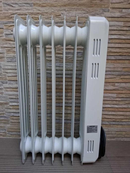 Vende-se Aquecedor a Óleo Novo