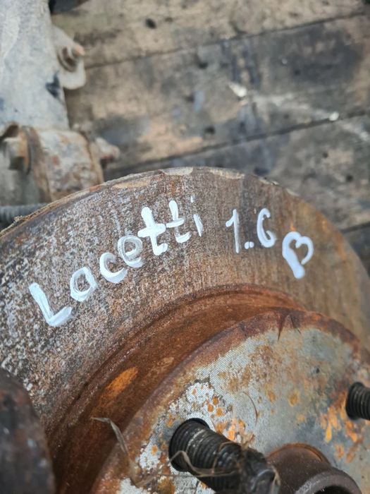 Передні стойки амортизатор супорт ступиця цапфа Chevrolet Lacetti 1.6