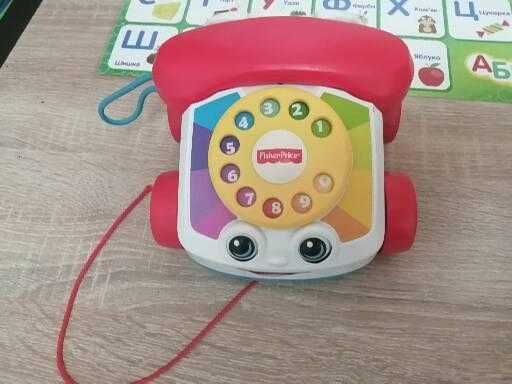 Развивающая игрушка машинка-телефон