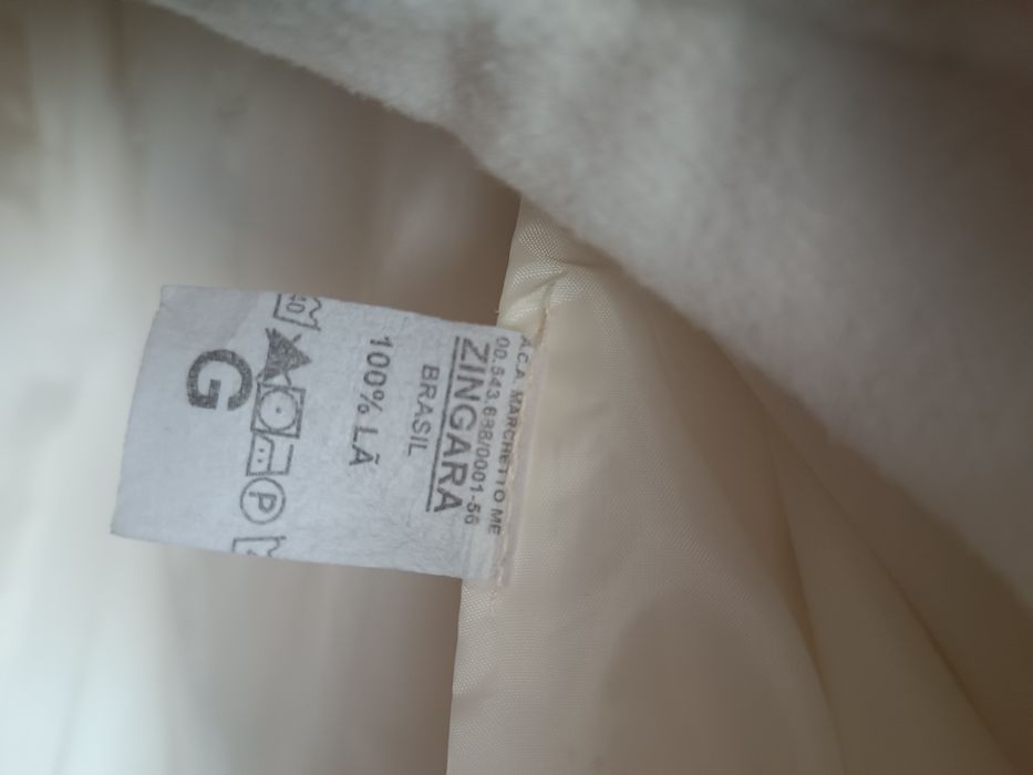 Casaco comprido branco
Em ótim