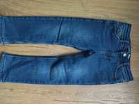 Ocieplane spodnie jeansy Okaidi rozmiar 104cm