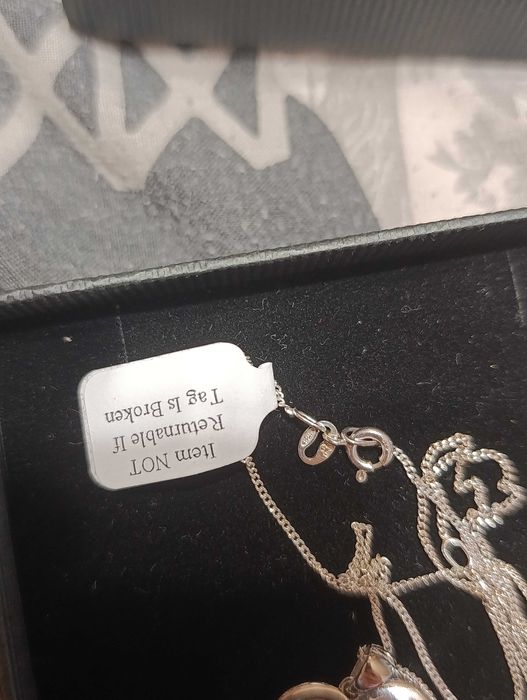 Кулон в форме сердца из желтого золота и серебра 10 карат