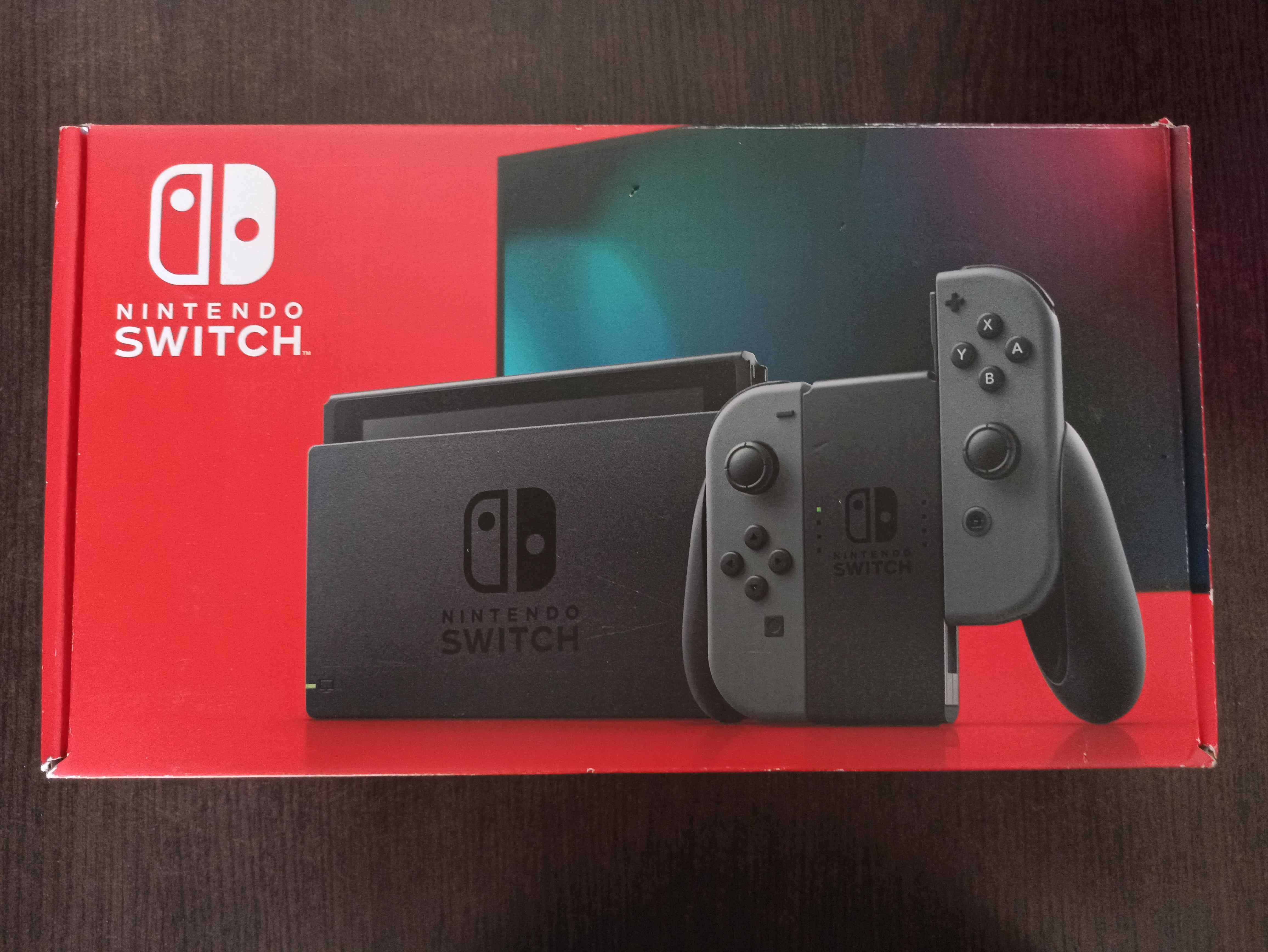 Nintendo Switch (ciemnoszary) + pokrowiec + gra + karta pamięci 128GB