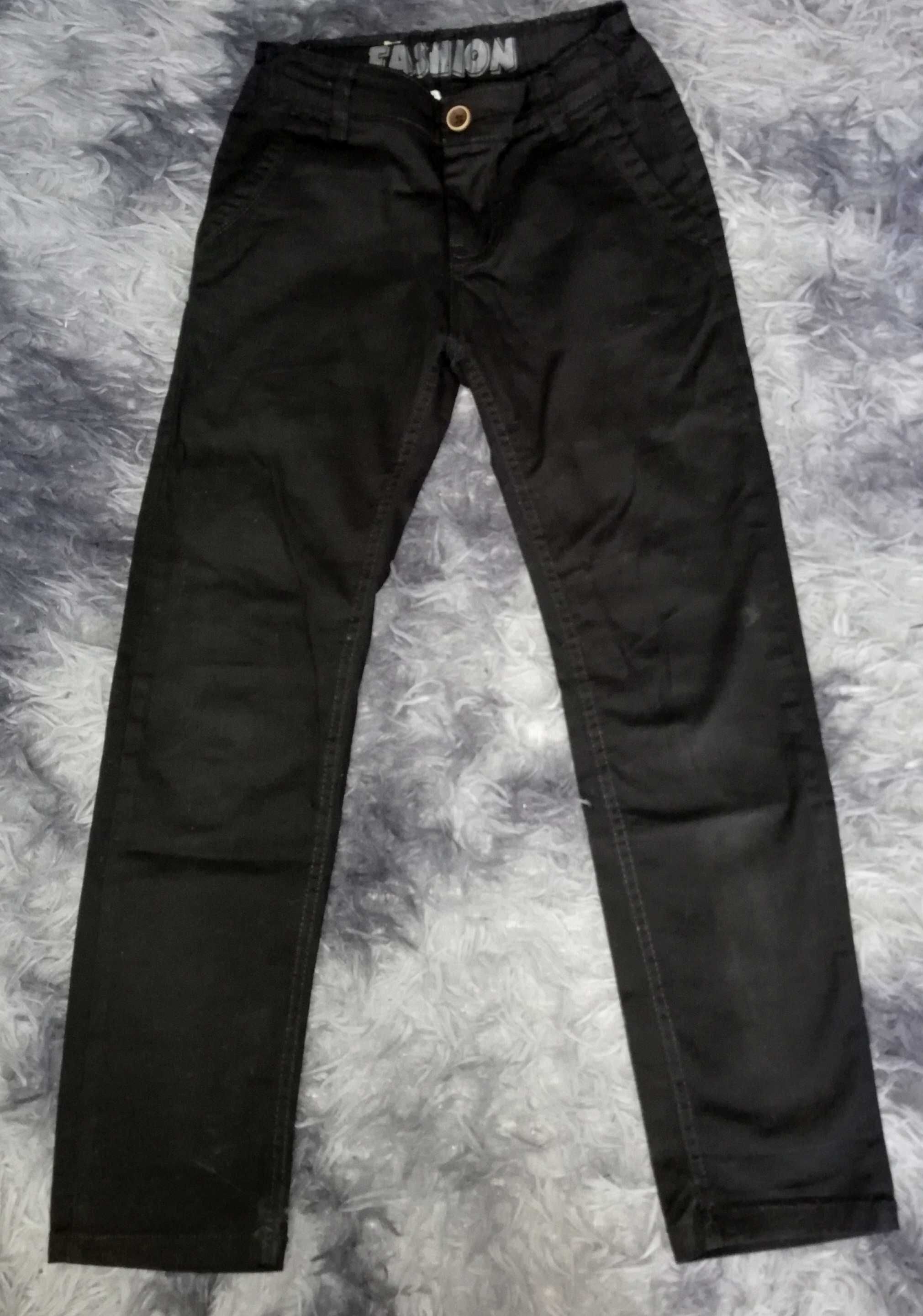 Czarne jeansy spodnie 134/140