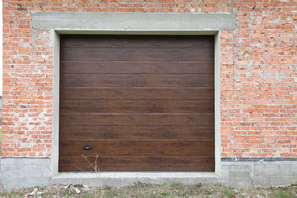 Автоматичні або з ручним відкриванням секційні підйомні ворота в гараж