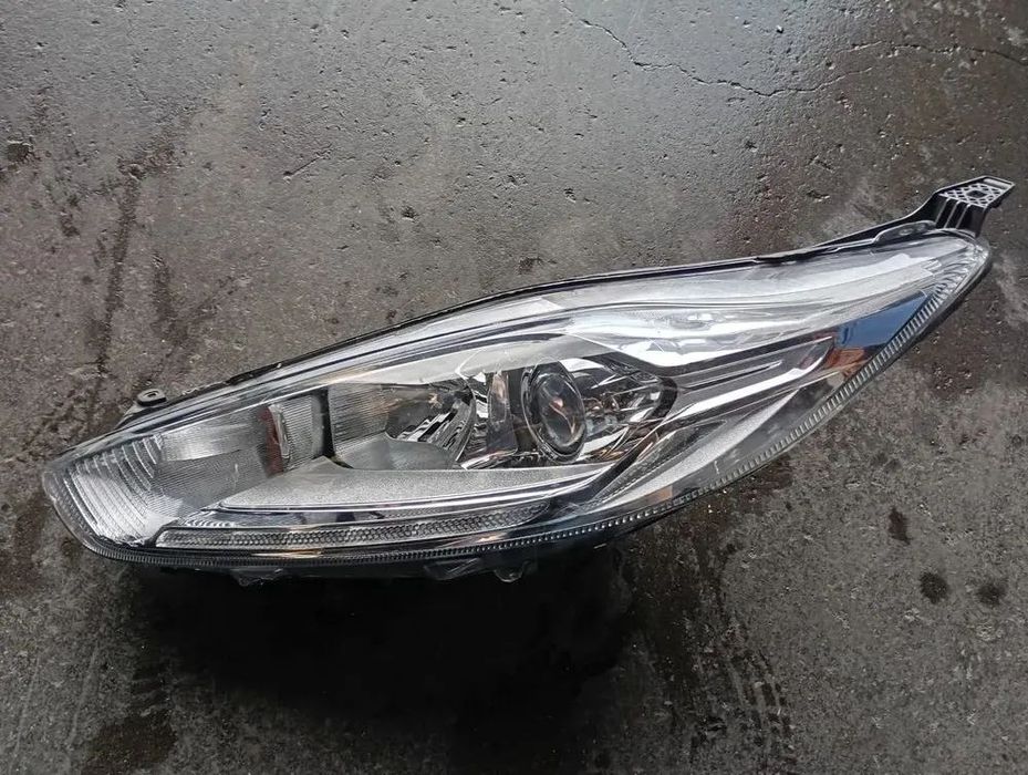 FORD FIESTA FAROL ESQUERDO - FF603