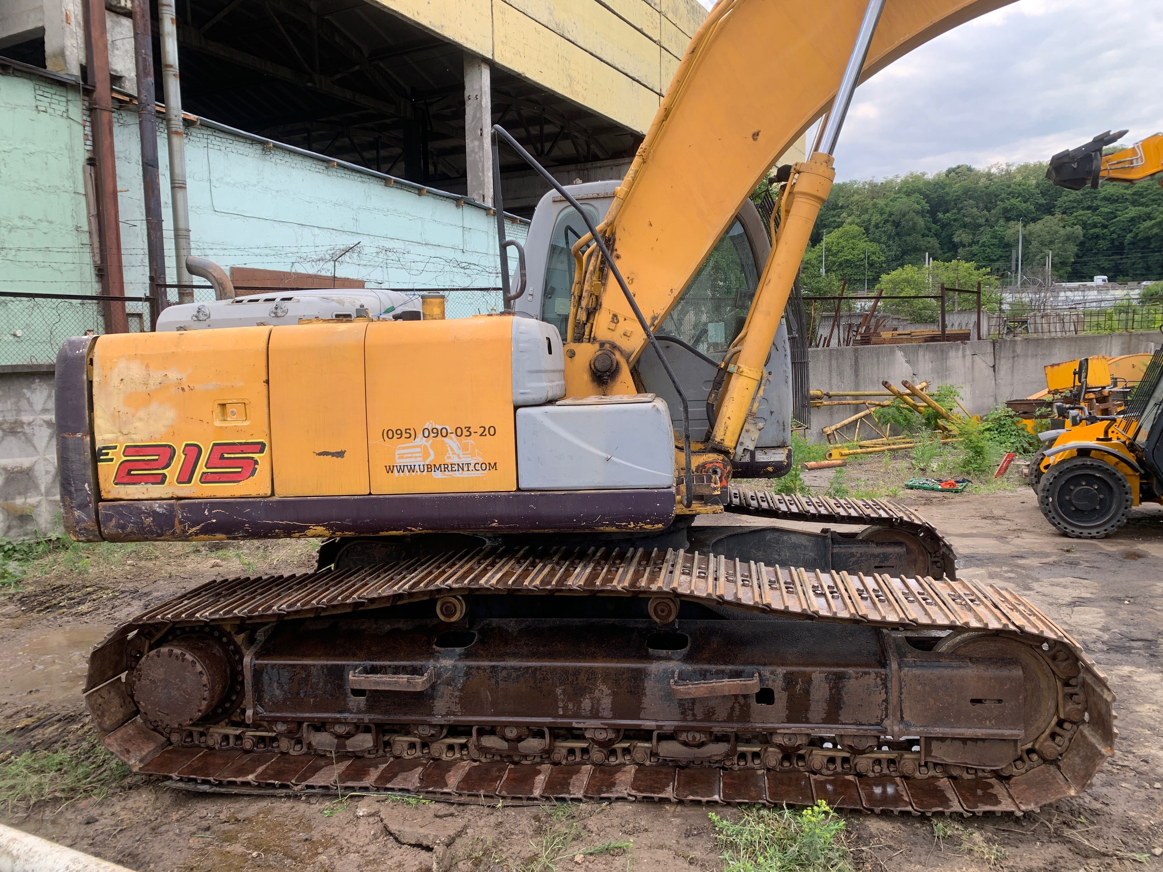 Гусеничний екскаватор NEW HOLLAND E215 Гусеничный экскаватор