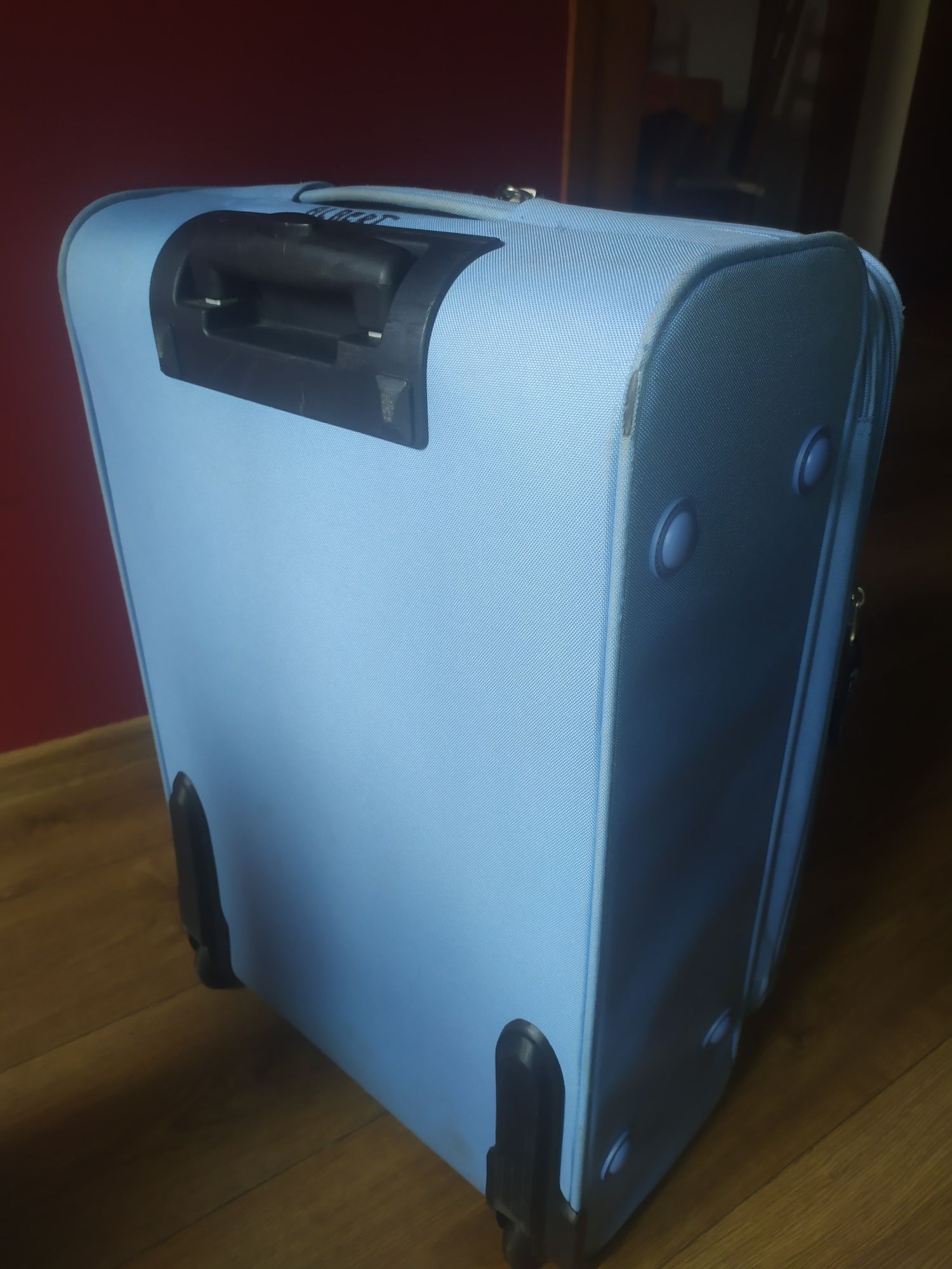 Duża walizka na 2 kółkach rozszerzana Samsonite błękitna 62x41x31cm