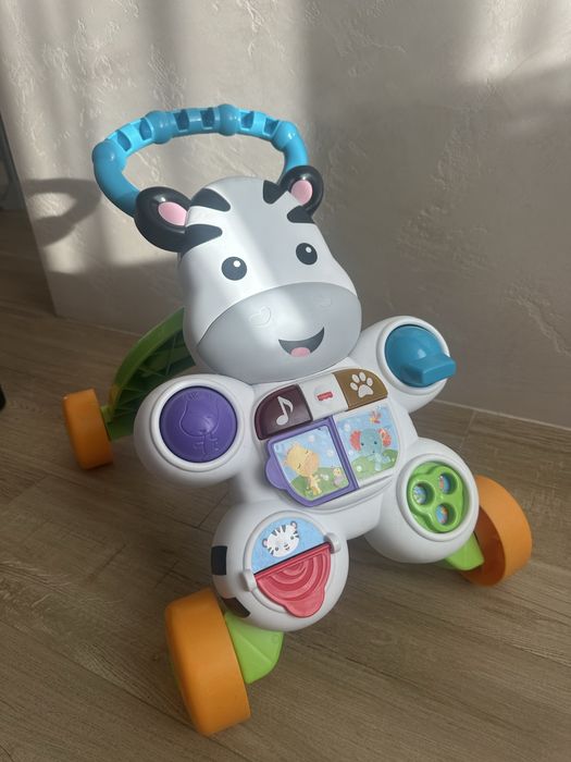 Толокар Fisher Price в коробке, состоние нового