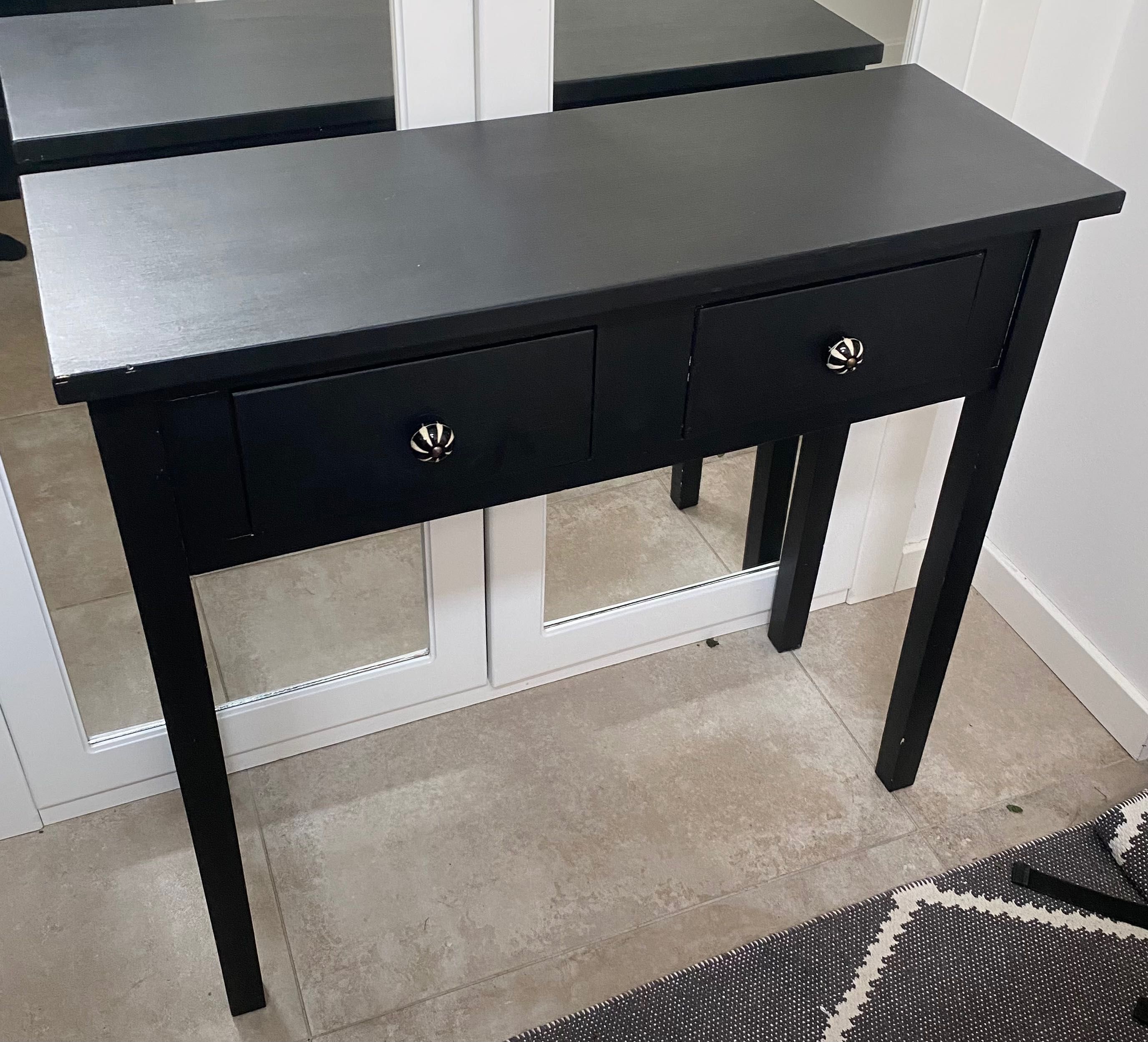 Mesa consola preta com duas gavetas