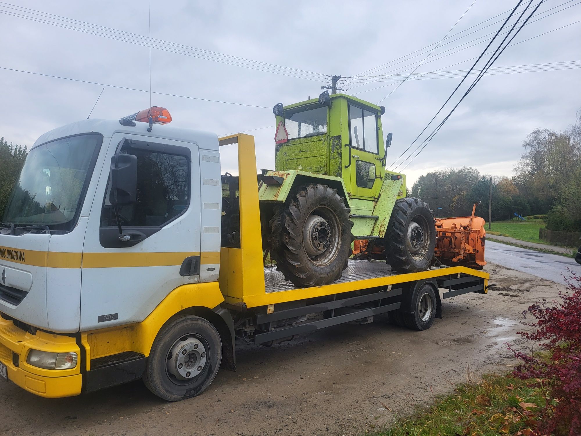 Transport maszyn budowlanych i rolniczych Autolaweta Pomoc Drogowa