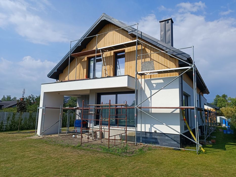 Docieplenia Elewacje budynków.  Wykończenia wnętrz