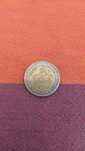 Greek coin with the letter S in one of the stars