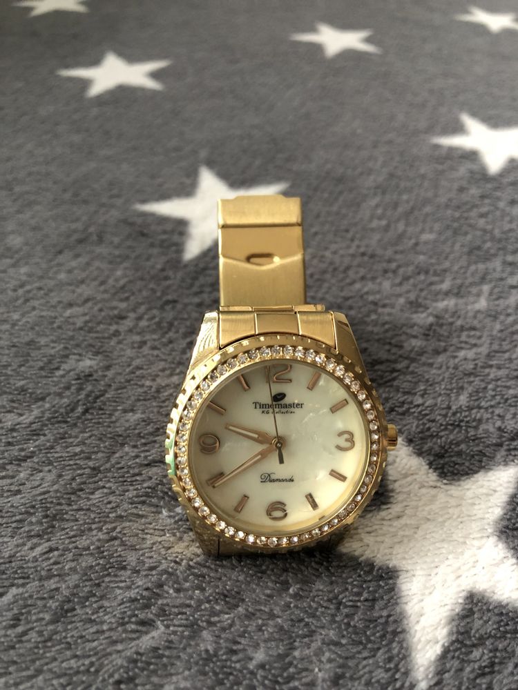 Zegarek damski zloty Timemaster z cyrkoniami na bransolecie