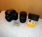 Canon EOS550D DSLR + 2 lentes 50mm + , bateria, carregador, estojo