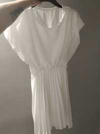 Biała sukienka uni