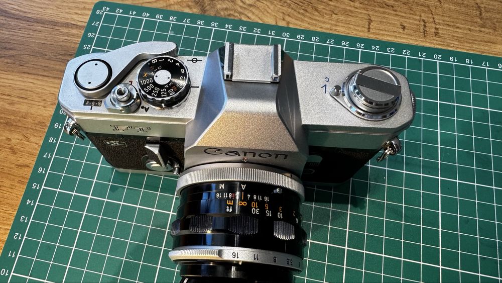 Canon FT-QL + FL 50 mm f/1.8 | analogowy SLR, quick load, stan idealny