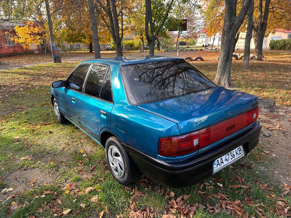 Mazda 323 расход 7л/100км