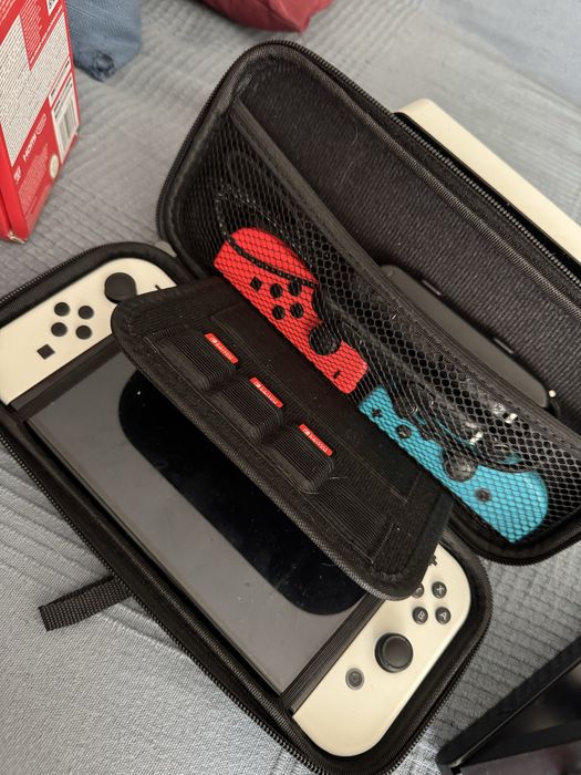 Nintendo switch oled + jogos + acessorios