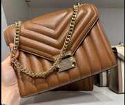 Michael kors castanha