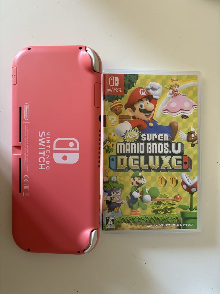 Nintendo switch lite + super mario deluxe