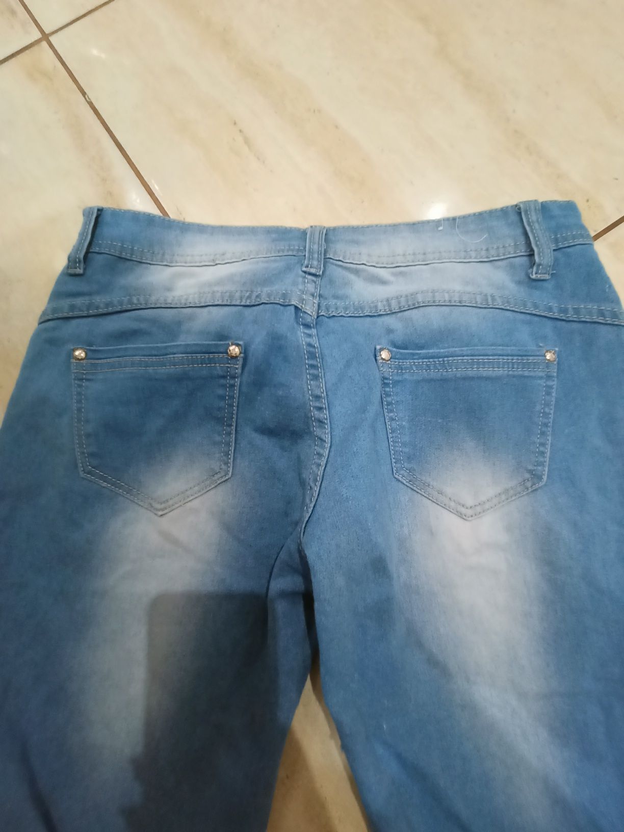 Spodnie jeans damskie