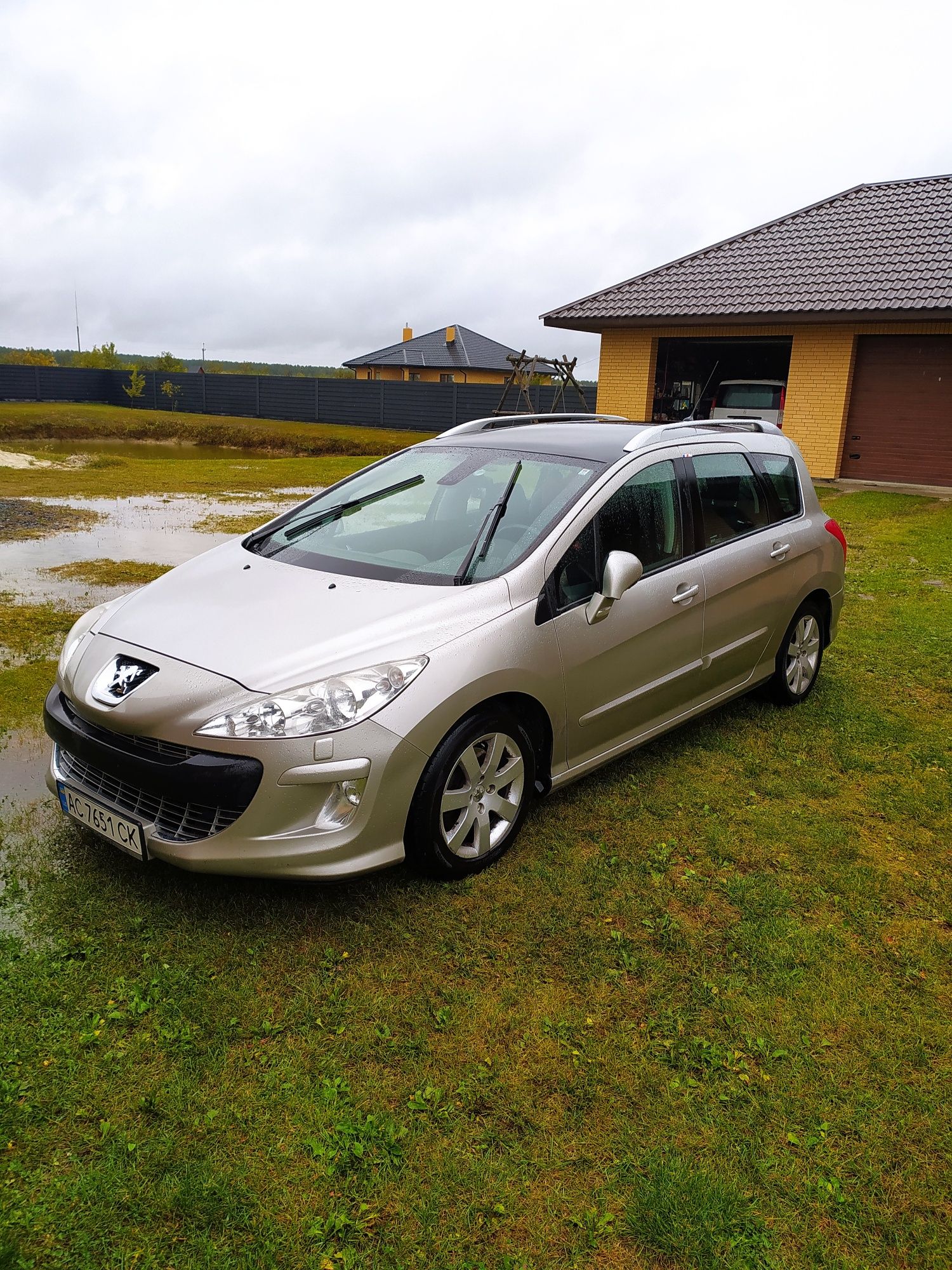 Peugeot 308 SW T7 2009 рік